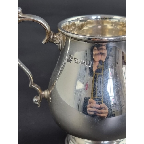 11 - A silver milk jug, by Elkington & Co, Birmingham 1968, 10.5cm high, 169g.