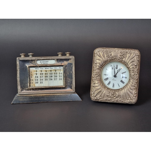 122 - A silver mounted quartz easel clock, by Keyford Frames Ltd, London 1990, 11.5cm high; together with ... 