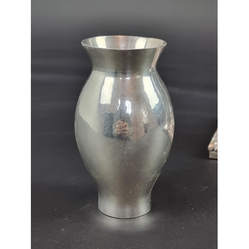 123 - A silver vase, by V S S, London 1955, 11cm high, 144g; together with a pair of silver plated candles... 