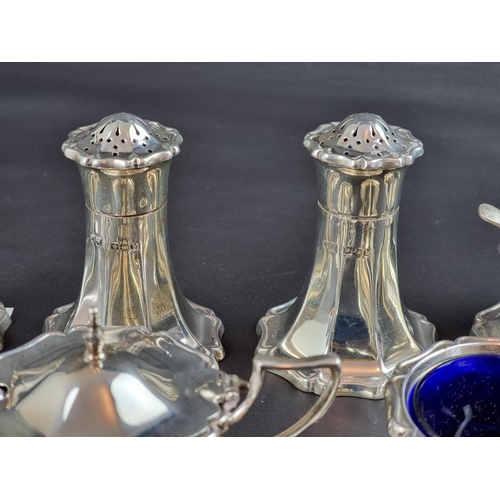 127 - A silver condiment set, by R F Mosley & Co, Sheffield 1919/20/21, 561g. (9)