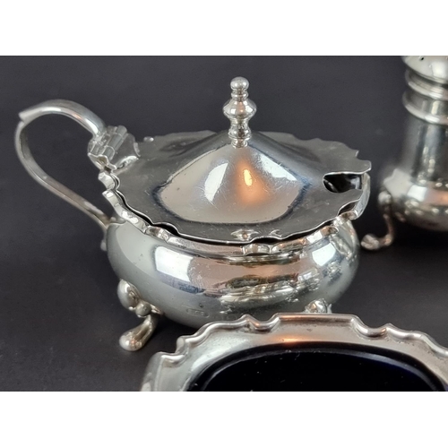 128 - A silver four piece condiment set, by F C Richards, Birmingham 1924; together with two silver p... 