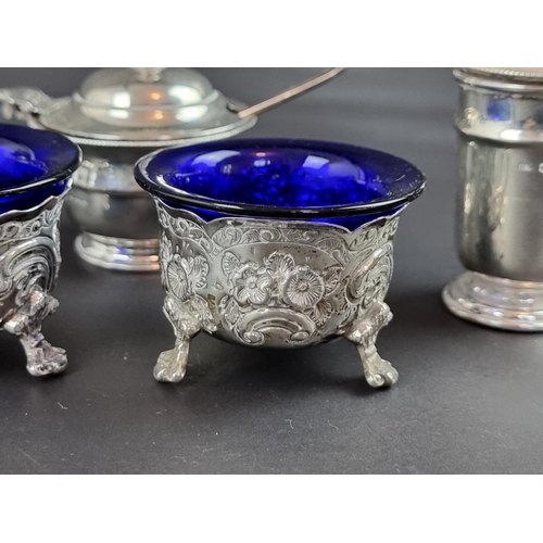 130 - A silver three piece condiment set, by Viner's Ltd, Sheffield 1949; together with a pair of silver s... 