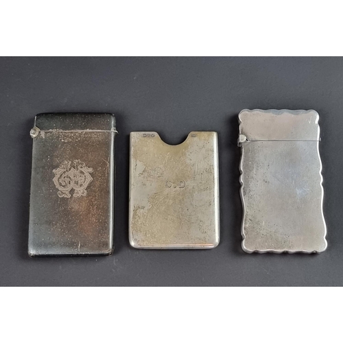 134 - An Edwardian silver card case, by Matthew John Jessop, London 1902, 8.5cm high; together with two ot... 