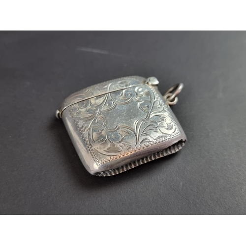 138 - A silver vesta case, by E J Partridge, 4.5cm high; together with two other silver vesta cases, ... 