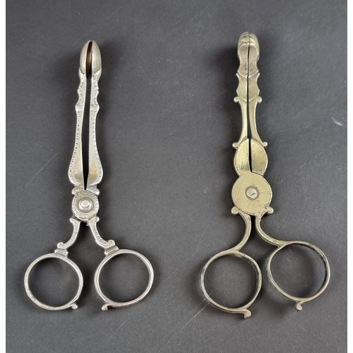 154 - A pair of Victorian silver sugar tongs, by Hilliard & Thomason, Birmingham 1879; together with a... 