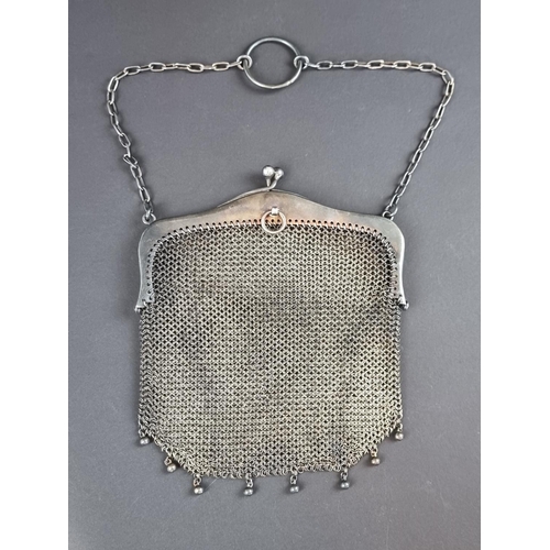 161 - A continental white metal mounted mesh purse, stamped '935', 11cm wide.