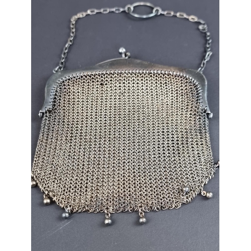 161 - A continental white metal mounted mesh purse, stamped '935', 11cm wide.