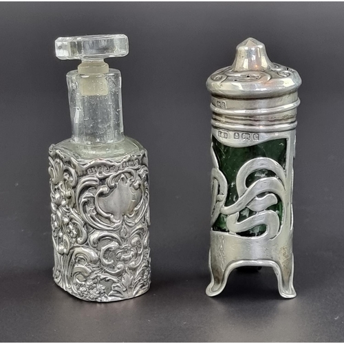 170 - An Edwardian silver mounted scent bottle, by Levi & Salaman, Birmingham 1904, 8cm high; together... 