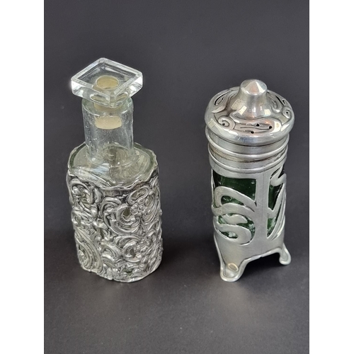 170 - An Edwardian silver mounted scent bottle, by Levi & Salaman, Birmingham 1904, 8cm high; together... 