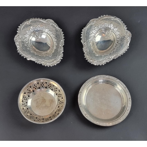 175 - A pair of Victorian silver salts, by M Bros, Birmingham 1894, 11cm wide; together with two silver di... 