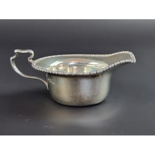 180 - An Edwardian silver cream jug and matching sugar bowl, by Atkin Brothers, Sheffield 1908/9, the bowl... 