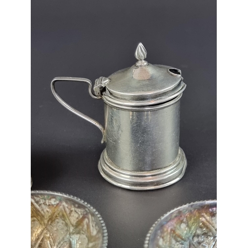 181 - A pair of silver salts, by Robert Harper, London 1865, 5.5cm diameter; together with three other sil... 