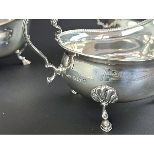 183 - A set of three silver sauce boats, by Adie Brothers Ltd, Birmingham 1923, height to handles 7.5cm, 3... 