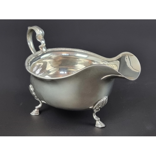 183 - A set of three silver sauce boats, by Adie Brothers Ltd, Birmingham 1923, height to handles 7.5cm, 3... 