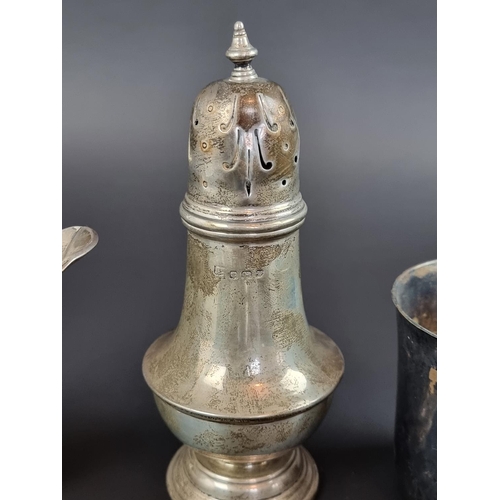 188 - A silver sugar caster, by S W Smith & Co, Birmingham 1920, 17cm high; together with five ot... 