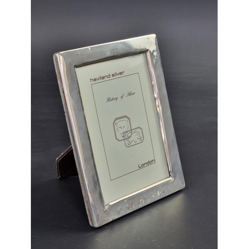 20 - A silver mounted easel photograph frame, by A Haviland-Nye, London, 18.5cm high.... 