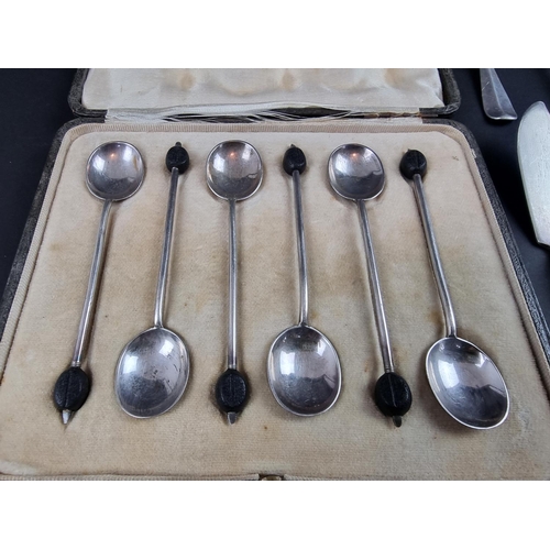 208 - A cased set of six bean handled coffee spoons, by Mappin & Webb Ltd, Sheffield 1919; together wi... 