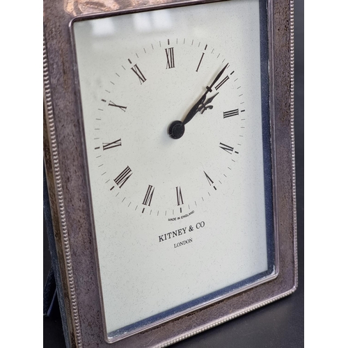 21 - A silver mounted easel clock, by Kitney & Co, London 1991, 15.5cm high.