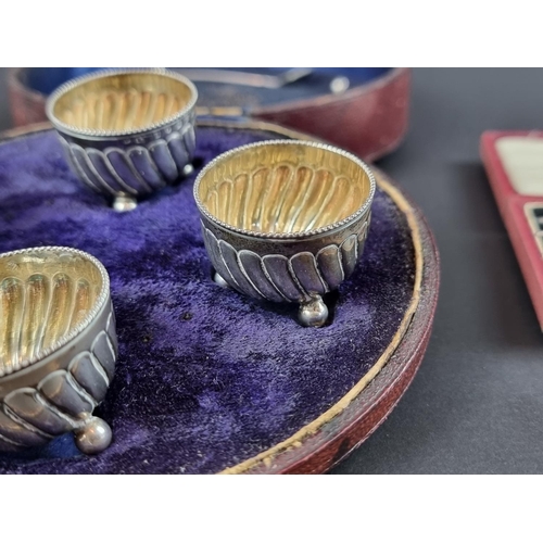 212 - A cased set of four silver salts, by Horace Woodward & Co, Birmingham 1881, with four associated... 