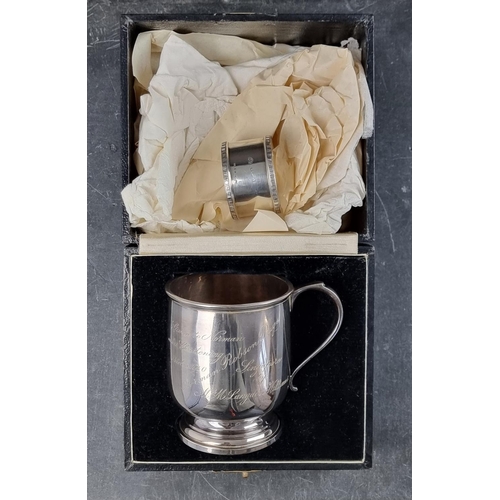 212A - A cased silver Christening mug, by Adie Brothers Ltd, Birmingham 1939, height to handle 8.5cm; toget... 