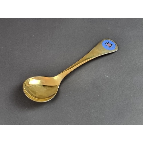 214 - A Georg Jensen silver gilt and enamel '1972' spoon, stamped 'Sterling Denmark, 925'.... 