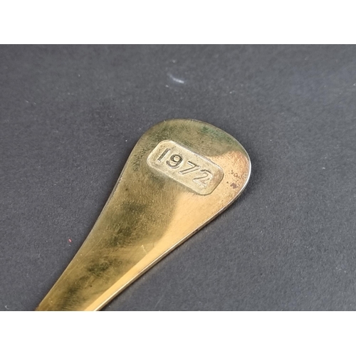 214 - A Georg Jensen silver gilt and enamel '1972' spoon, stamped 'Sterling Denmark, 925'.... 