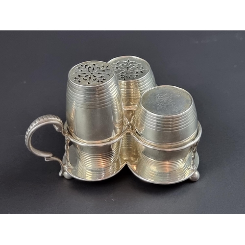 217 - A Victorian silver three piece barrel form cruet stand, by George Fox, London 1874, 195g.... 