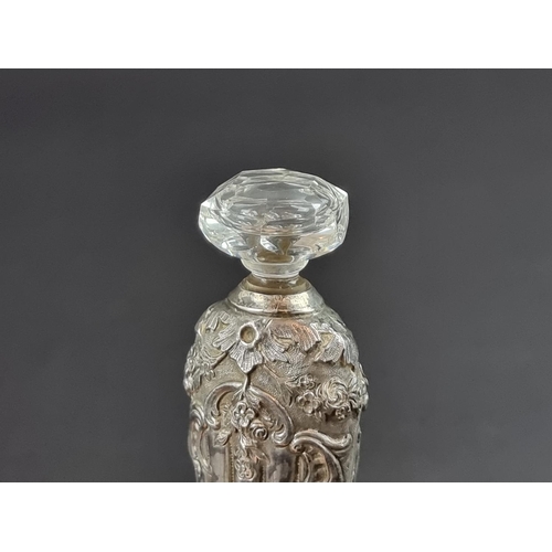 219 - A Victorian silver scent flask, by Edward Brown, London 1891, height excluding stopper 17cm.... 