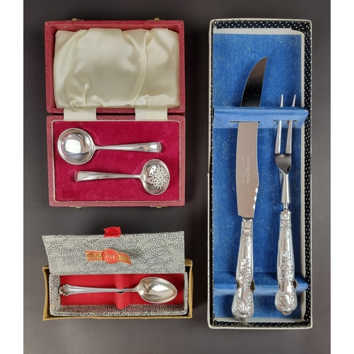 222 - A cased sugar sifter and matching ladle, by Francis Howard Ltd, Sheffield 1971; together with a case... 