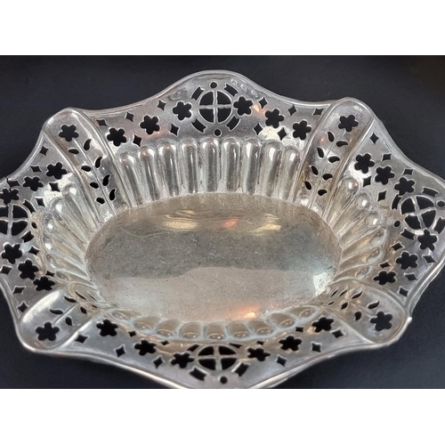 224 - A Victorian silver dish, probably by Samuel M Levi, Birmingham 1886, 13cm wide; together with seven ... 