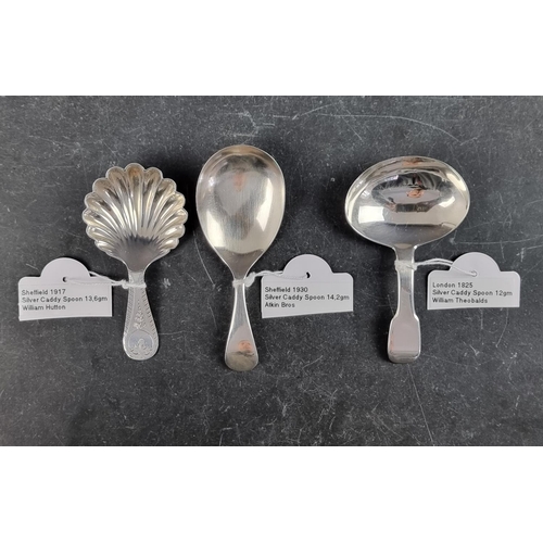 227A - A silver caddy spoon, by Atkin Bros, Sheffield 1930; together with two other silver caddy spoons, 39... 