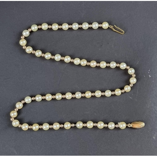 236 - A cultured pearl and gold bead necklace, with 9ct gold clasp, 42cm long.