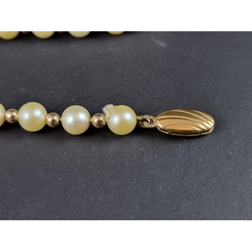 236 - A cultured pearl and gold bead necklace, with 9ct gold clasp, 42cm long.