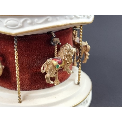 244 - An Igor Carl Fabergé for Franklin Mint 'The Jewelled Carousel', circa 1979, the white and gilt ceram... 