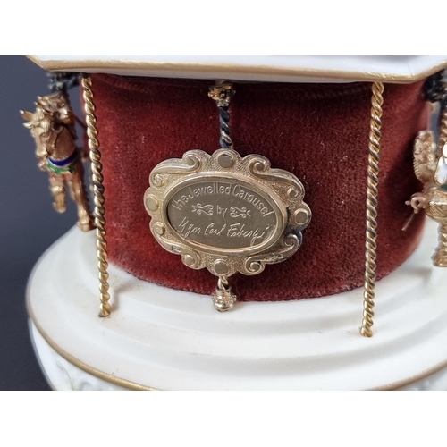 244 - An Igor Carl Fabergé for Franklin Mint 'The Jewelled Carousel', circa 1979, the white and gilt ceram... 