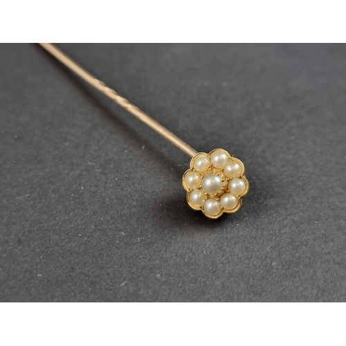 247 - A 19th century yellow metal stick pin, with floral cluster terminal set eight split pearls, cased.... 