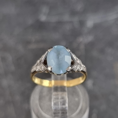 263 - An aquamarine and diamond ring, set faceted aquamarine with five diamonds to each shoulder, stamped ... 