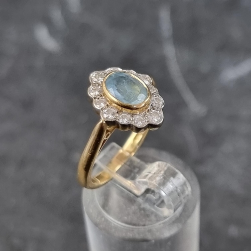 264 - An 18ct gold aquamarine and diamond oval cluster ring, by A P H, Birmingham 2003, size K, gross weig... 