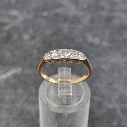 265 - A yellow metal diamond five stone ring, stamped '18ct', set central old cut diamond and four single ... 