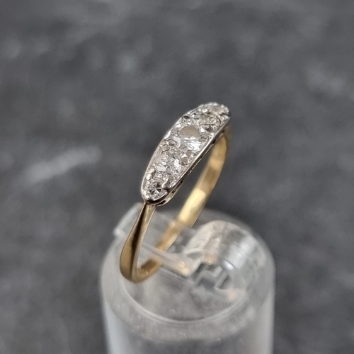 265 - A yellow metal diamond five stone ring, stamped '18ct', set central old cut diamond and four single ... 