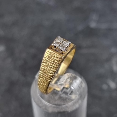 266 - A yellow metal diamond four stone ring, stamped '18ct', size L.