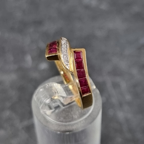 267 - A diamond and ruby crossover ring, set five brilliant cut diamonds to centre with a row of five pave... 