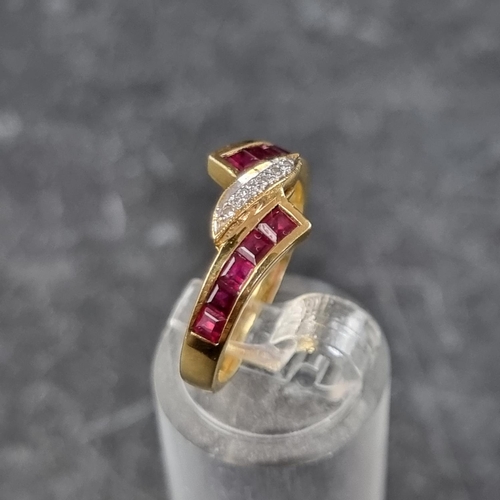 267 - A diamond and ruby crossover ring, set five brilliant cut diamonds to centre with a row of five pave... 