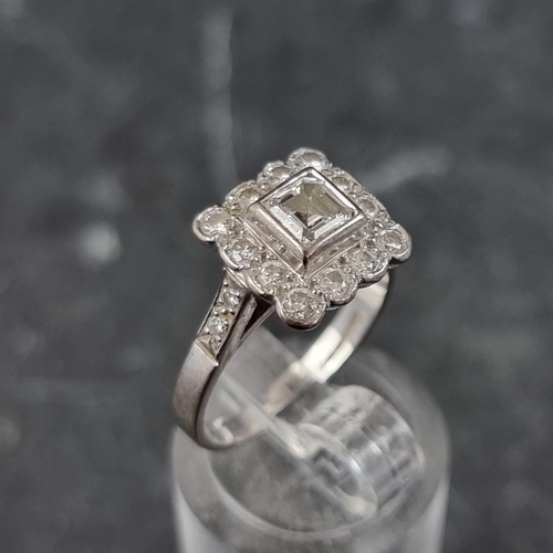 272 - An 18ct white gold diamond cluster ring, set  Asscher cut diamond surrounded by twelve brilliant cut... 