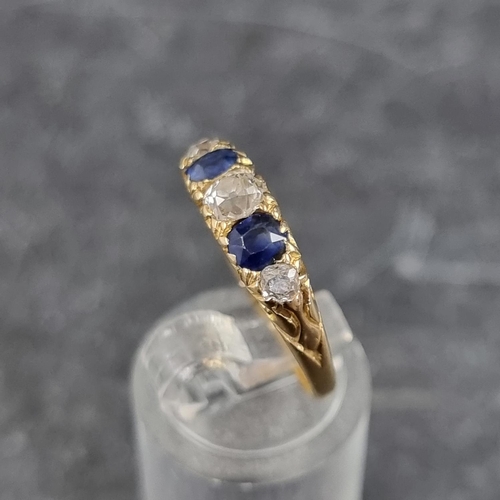 273 - A Victorian yellow metal diamond and sapphire five stone ring, stamped '18ct', size N.... 