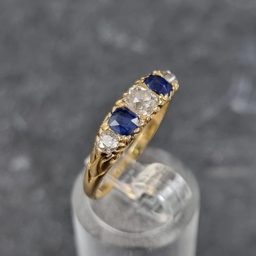 273 - A Victorian yellow metal diamond and sapphire five stone ring, stamped '18ct', size N.... 