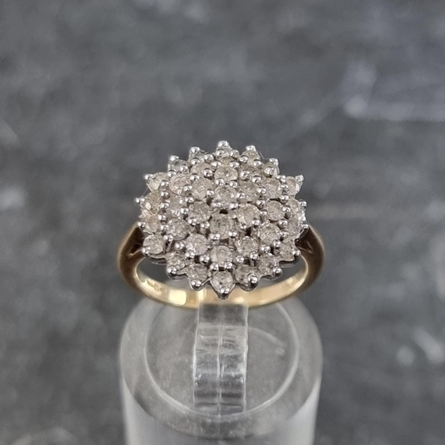 285 - A 9ct gold diamond floral cluster ring, size I1/2, gross weight 4g.