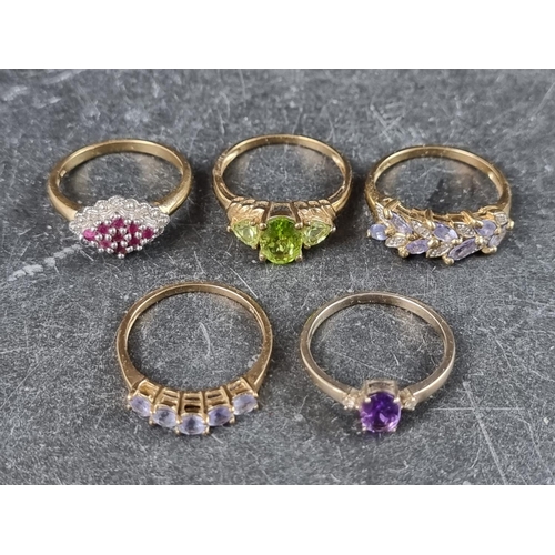 291 - Five 9ct gold gem set rings, gross weight 10.9g.