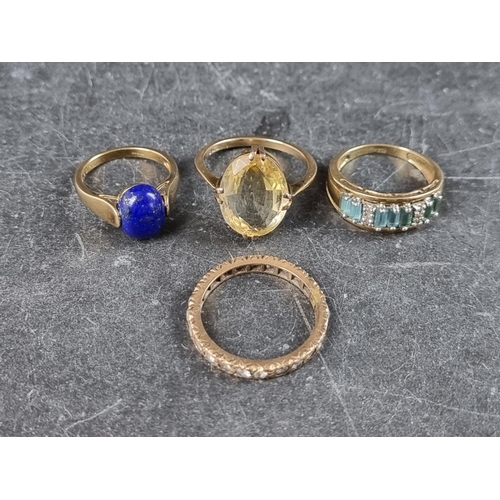 292 - Two 9ct gold gem set rings, gross weight 5.4g; together with two similar yellow metal rings, stamped... 