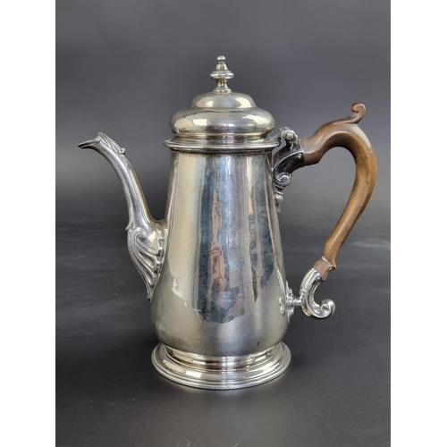 3 - A George II silver coffee pot, by Isaac Cookson, Newcastle 1742, 22cm high, 660g.... 